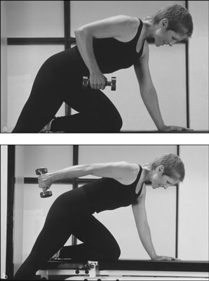 Make sure your shoulder doesn’t drop below waist-level during the triceps kickback. [Credit: 