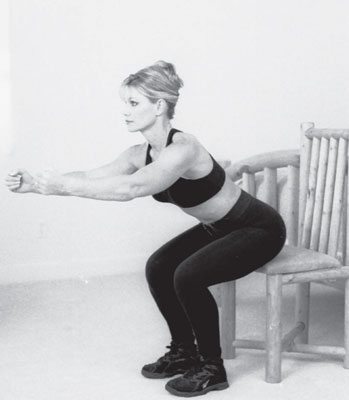 Slowly lower your buns toward the chair without actually sitting down.