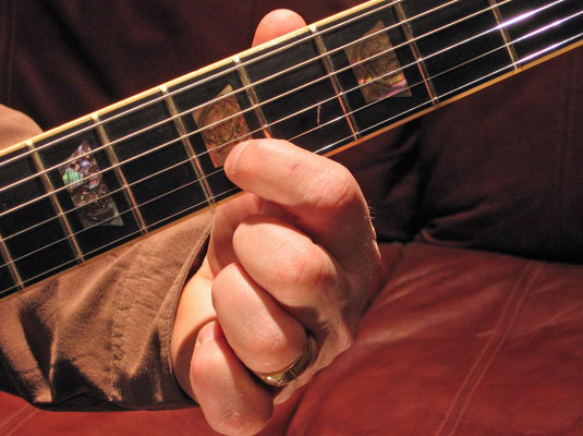 Play the fifth (yes, back to the fifth for this one) fret of the B (2nd) string and then play the open high E (1st) string.