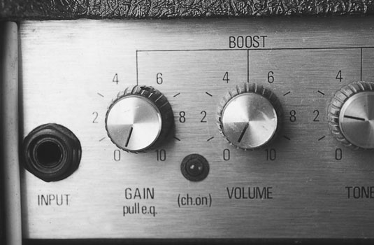 Turn the amp’s gain and master volume controls all the way down.