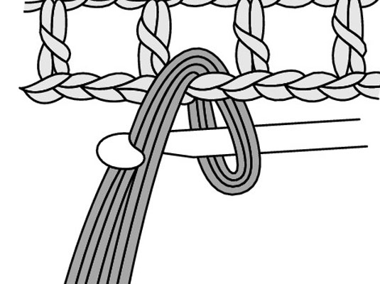 Draw the loose ends of the yarn through the loop.