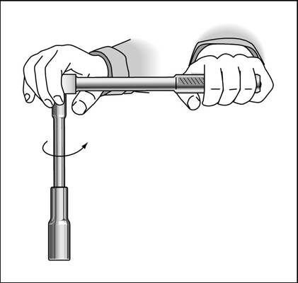 Loosen the spark plug by turning it counterclockwise.