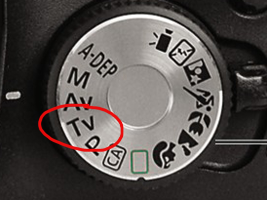Set the Mode dial to Tv (shutter-priority autoexposure).