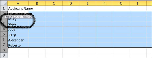 Drag a row boundary to manually change the row height.