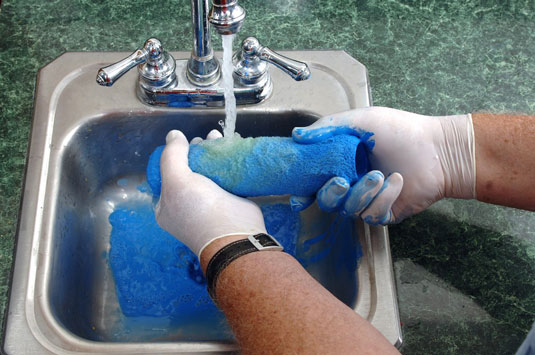 Rinse the roller cover in warm running water.