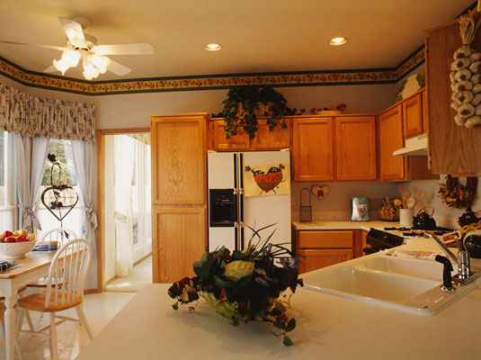 Country cottage decorating is a popular choice for kitchens.