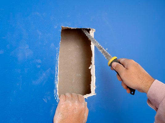 How To Fix Large Holes In Drywall With A Patch Dummies