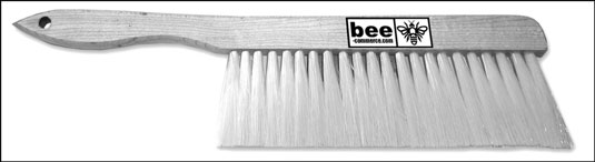 Use a soft bee brush to gently remove bees from frames and clothing.