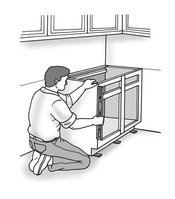 Check the cabinets again to make sure that they are plumb and level in all directions, and that they still align properly with the two reference lines and with each other.