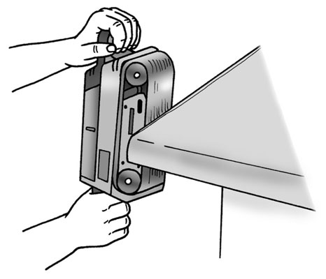 Hold the sander as shown. Avoid an upward cut, which might chip or lift the plastic laminate.