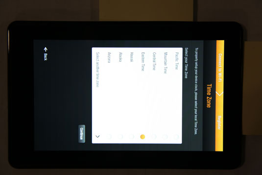 Tap to select a time zone from the list provided and tap Continue.