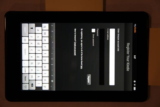 On the Register Your Kindle screen that appears, enter your Amazon account information, e-mail address, and a password in the appropriate fields.