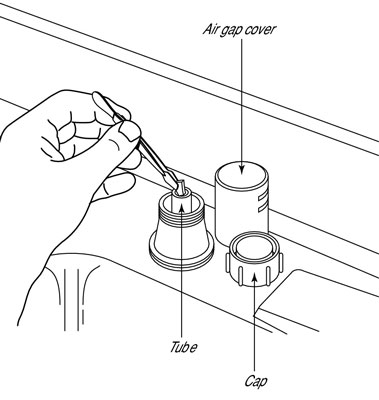 Use your tweezers to clean out the tube.