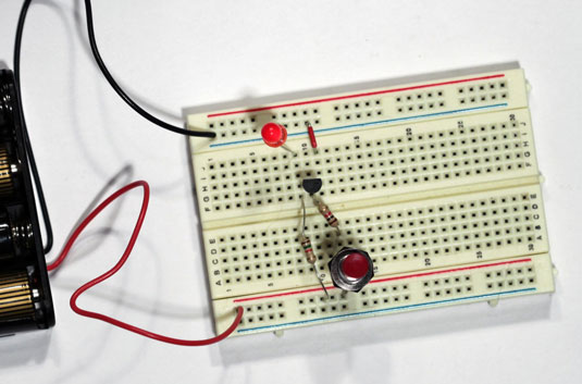 A transistor NOT gate assembled on a breadboard.
