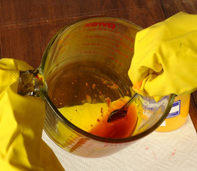 Stir continuously until all the dye particles have dissolved completely. If the solution appears cloudy, the dye has not fully dissolved.