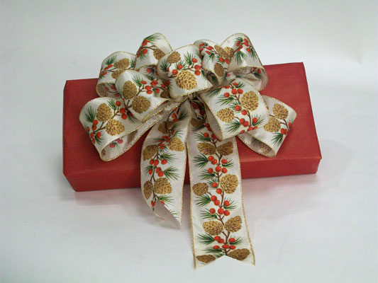 Place finished bows on gifts, wreaths, and garlands.