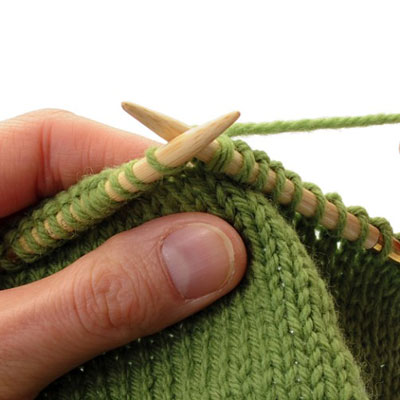 Continue to knit in a spiral path, moving the stitches along the cable as needed.