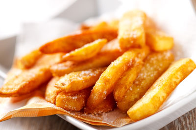 Deep-fried foods, including French fries, can cause you to feel heavy and sluggish because the high levels of fat in these foods slow digestion.