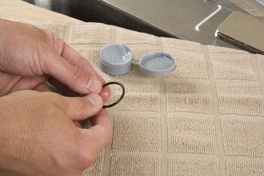 Coat the O-ring with silicone grease.