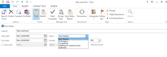 Click the scroll-down button (triangle) at the right end of the Status box to see a menu that enables you to change the status of the task.
