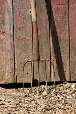 Blend compost with a pitchfork and put a small rake to use.