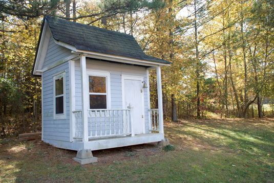 A child’s playhouse or play structure can be converted into a smart chicken coop.