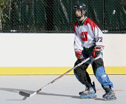 A hockey player in full gear.