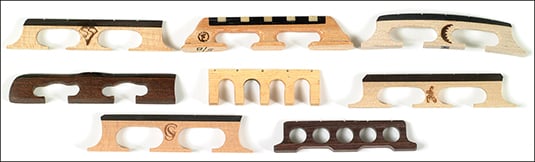 Banjo bridges come in a variety of woods, weights, and sizes. [Credit: Photograph courtesy of Elder