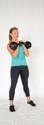 Clean a kettlebell or dumbbell up into the rack position.