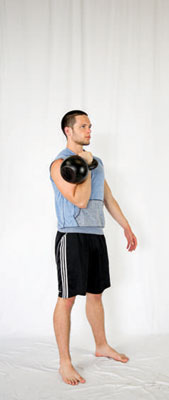Clean a weight (either a kettlebell or dumbbell) up into the rack position.