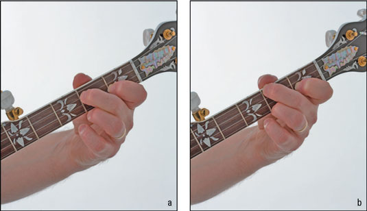 Here’s how your hand looks fretting the D7 (a) and C (b) chords. Note the position of the thu