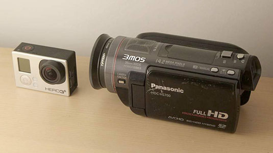 GoPro and Panasonic HD camcorder side by side.