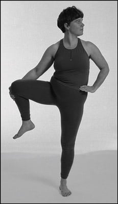 Toe Stand - This posture will help develop balance and stillness. It  stretches and strengthens the feet, legs, knees, hips, abdomen, and lower  back., By Yogafreak studio