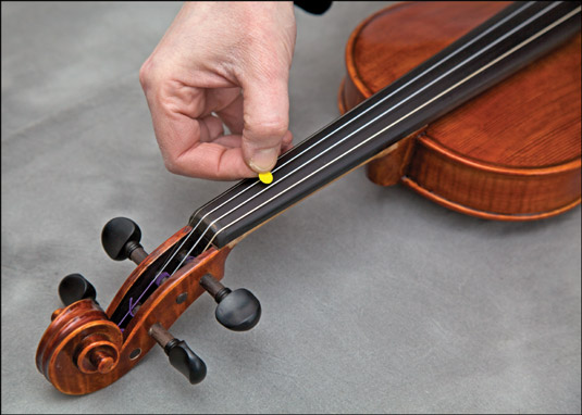 Marking the spot for finger 1. [Credit: Photograph by Nathan Saliwonchyk]