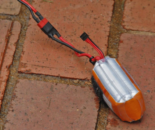 Bury swollen LiPo batteries in a bucket of sand. [Credit: Source: U.S. Navy photo by Photographer&#