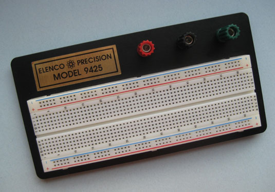 This solderless <i>breadboard</i> has 830 contact holes.