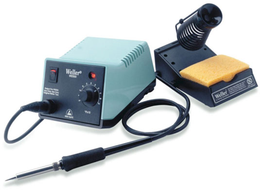 The Weller WES51 <i>soldering station</i> includes a temperature-adjustable soldering iron and a stand.