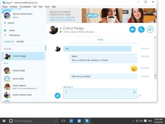 Chatting with others on Skype.