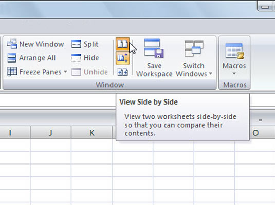 Click the View Side by Side button in the Window group of the View tab.