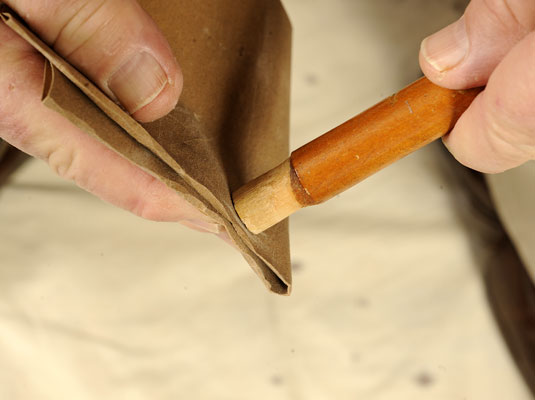 Clean off old glue with sandpaper.