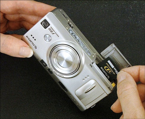 Insert your memory card into (or remove it from) your digital camera.