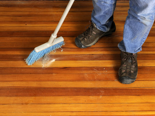 Thoroughly clean the hardwood floor.