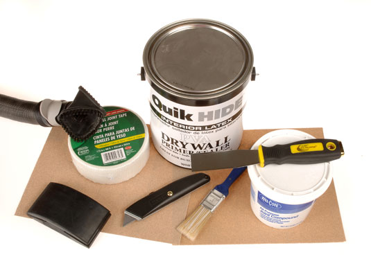 Buy a peel-and-stick drywall patch kit.