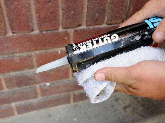 Clean the caulk tube.