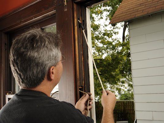 Pull the old cords out of the access panel and remove them from the new cords.