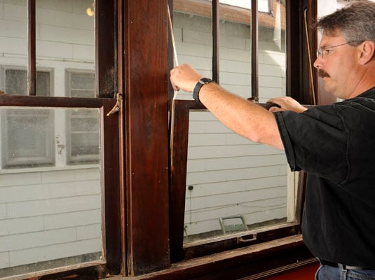 Put the lower sash back into the window frame.