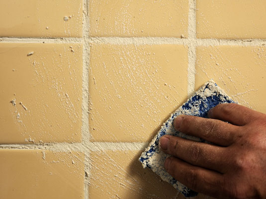 Clean up excess grout.