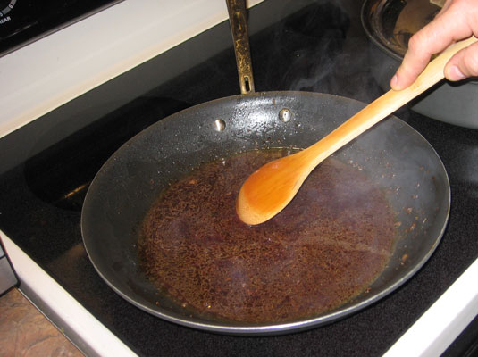 Raise the heat to high, bringing the liquid to a boil while you stir and scrape the browned bits until they dissolve into the sauce.