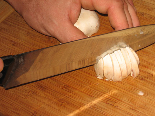 If you want smaller pieces of mushroom, slice the caps again at a 90-degree angle from the original slices.