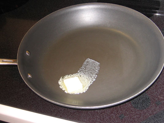 Melt a small amount of butter in a pan.